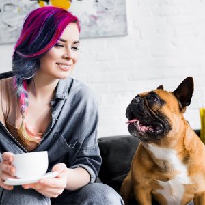 Woman smiling at dog